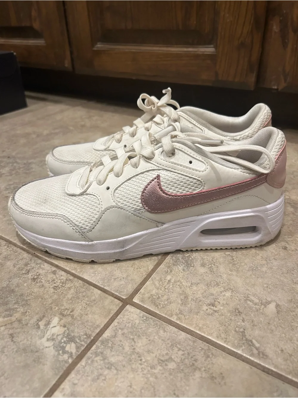 Nike Women's Cream Athletic Sneakers with Pink Swoosh